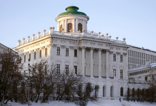 The Pashkov House is the famous Neoclassical mansion that stands on a hill overlooking the western wall of the Moscow Kremlin, near the crossing of the Mokhovaya and Vozdvizhenka streets. Its design has been attributed to Vasily Bazhenov. It used to be home to the Rumyantsev Museum (Moscow's first public museum) in the 19th century. The palace's current owner is the Russian State Library.