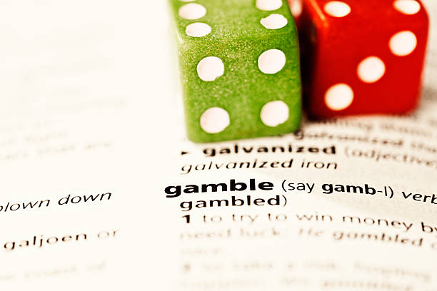 istock 'gamble' says highlighted dictionary word with dice alongside: bad idea 468754291