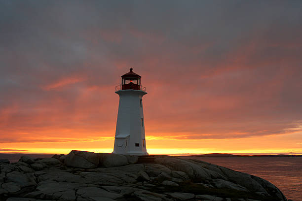 istock Lighthouse during sunset at Peggys Cove 468755860