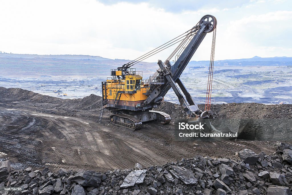 Electric Shovel in Open Pit Electric Shovel in Open Pit at THAILAND Backhoe Stock Photo