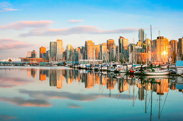 istock Vancouver skyline with Stanley Park at sunset, BC, Canada 468762134