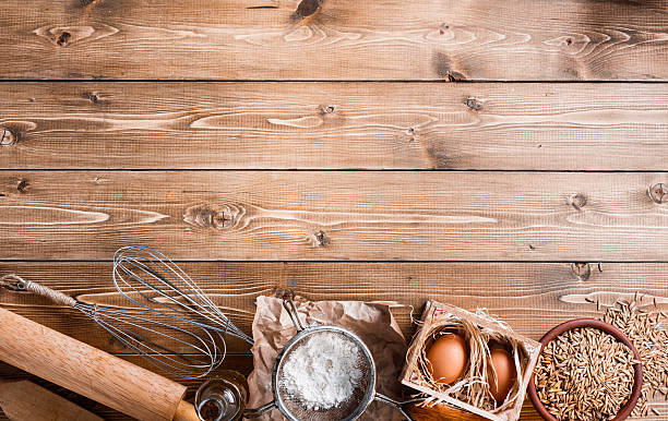 istock Ingredients for baking on empty light wooden background with pla 468762606