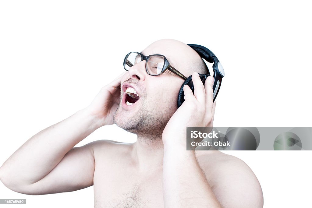 Funny guy with headphones isolated on white 2015 Stock Photo