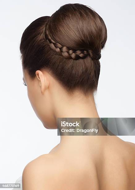 Elegant Updo Bridal Hairstyle Wrapped With Braided Pigtail Stock Photo - Download Image Now