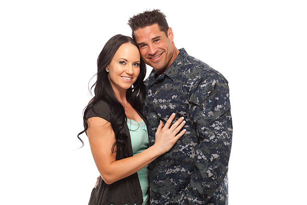istock Navy man with his wife against white background 468773328