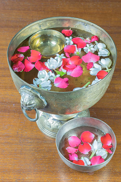 Water with jasmine and roses corolla in bowl