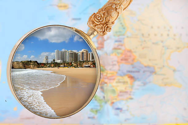 Rocha Beach Looking in on a popular beach in southern Portugal, Praia da Rocha, Algarve algarve map stock pictures, royalty-free photos & images