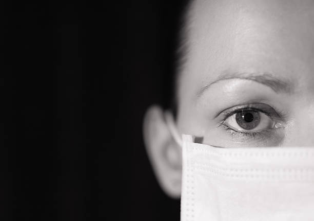 istock Woman with face mask 468783590