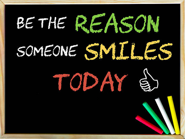 istock Be the reason someone smiles today message and Like sign 468784532