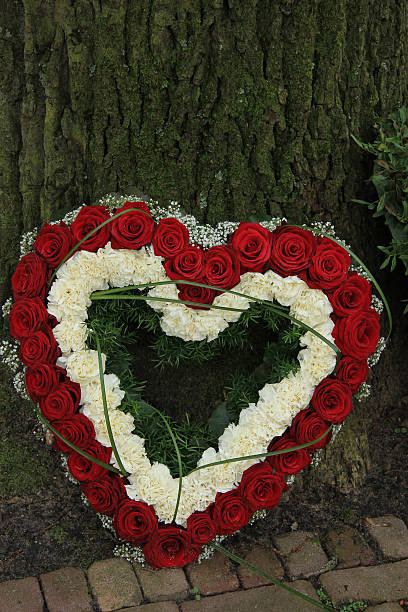 istock Heart shaped sympathy flowers 468785780