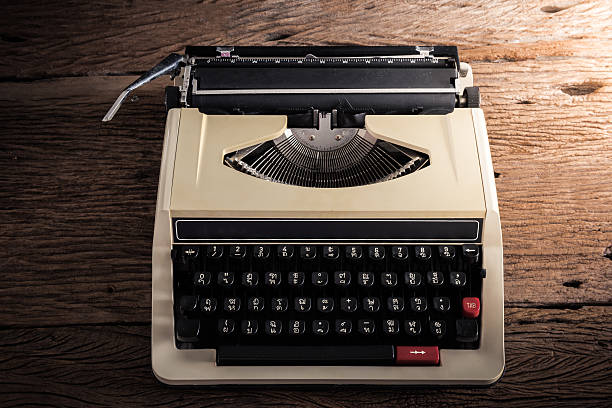 istock Vintage typewriter on wooden table 468786718