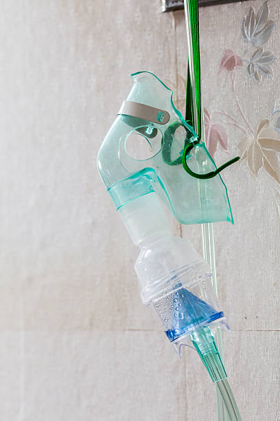 istock Close-up image of an oxygen mask hanging 468789406