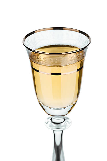 istock isolated section of wineglass with white wine 468789948