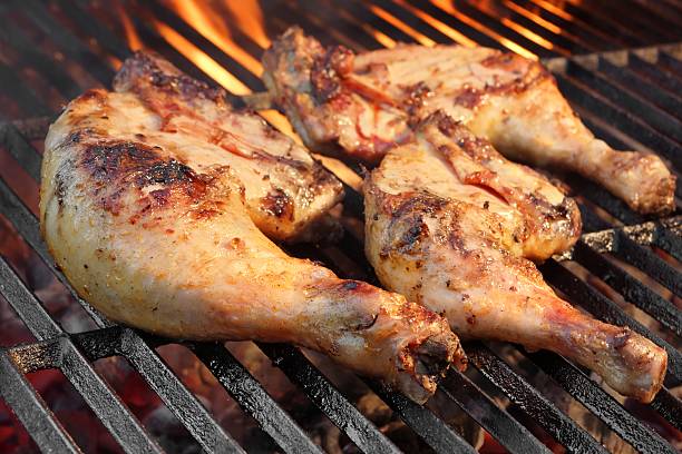 istock Marinated Chicken Legs Fried On The Hot Flaming BBQ Grill 468790022