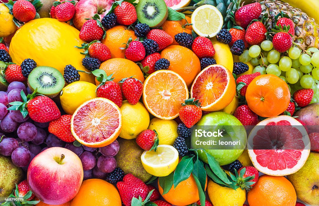 Fresh mixed fruits. Fresh mixed fruits background.Organic fruits multicolore background. Fruit Stock Photo