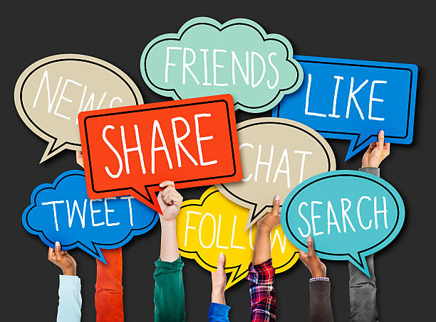istock Hands Holding Colorful Speech Bubbles Social Media Concept 468791316