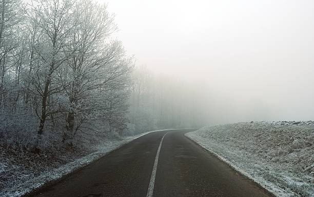 istock Frosty winter morning road in Hungary 468791698