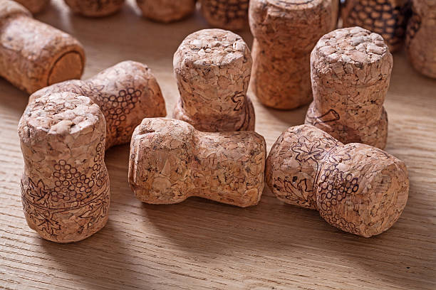 istock champagne corcks on wooden background 468791880