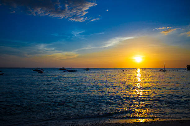 istock Small sailboat on the beautiful sunset in Philippines 468792655