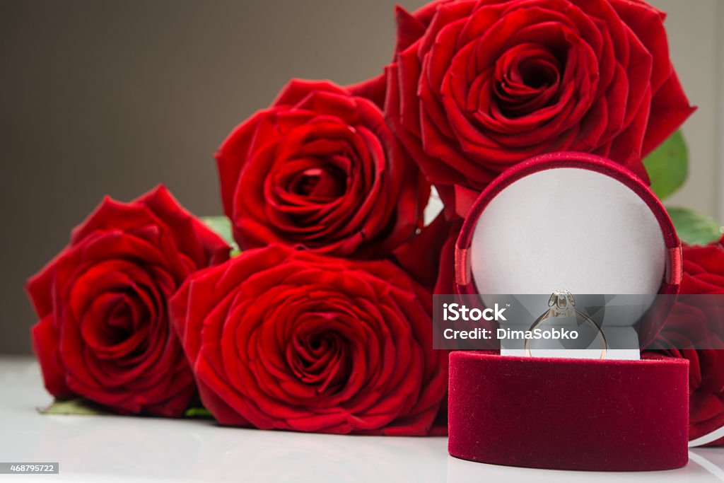 Beautiful red flowers rose Beautiful red flowers rose. Gold jewelry at box. 2015 Stock Photo