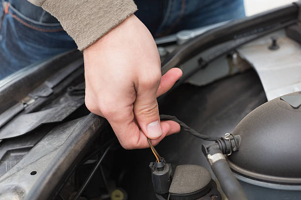 istock Man checking the engine of his car 468796456
