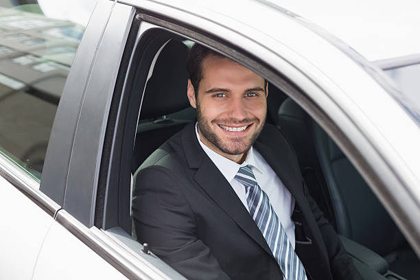 istock Businessman sitting in drivers seat 468796672