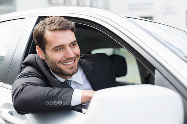 istock Businessman sitting in drivers seat 468796684