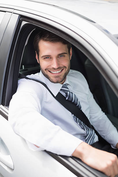istock Businessman sitting in drivers seat 468796686
