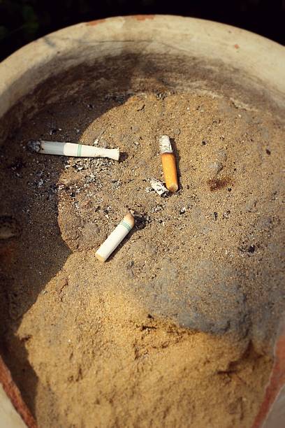 istock cigarette butts on the ground 468798990