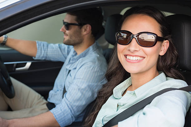 istock A young couple taking a road trip in a car 468799218