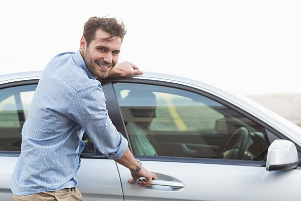 istock Young man opening the door 468799302