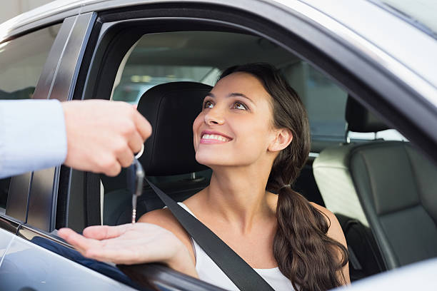 istock Young woman getting her key 468800634