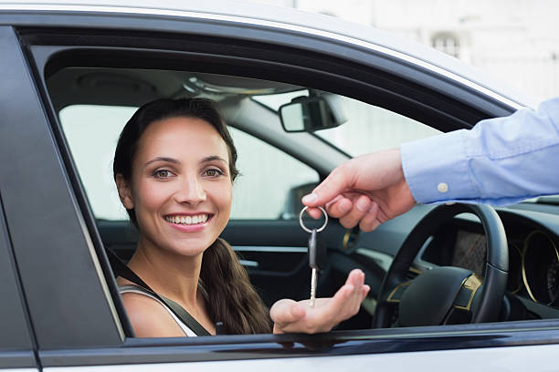 istock Young woman getting her key 468800664