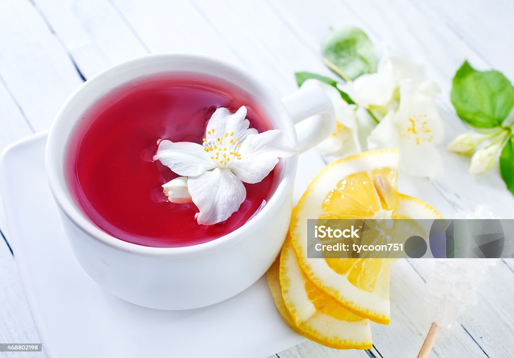 jasmin tea jasmin tea and jasmin flowers on the wooden table 2015 Stock Photo