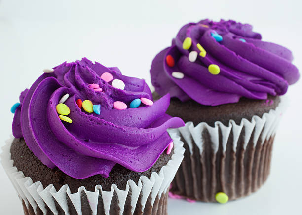 istock Purple pair of cupcakes 468805112