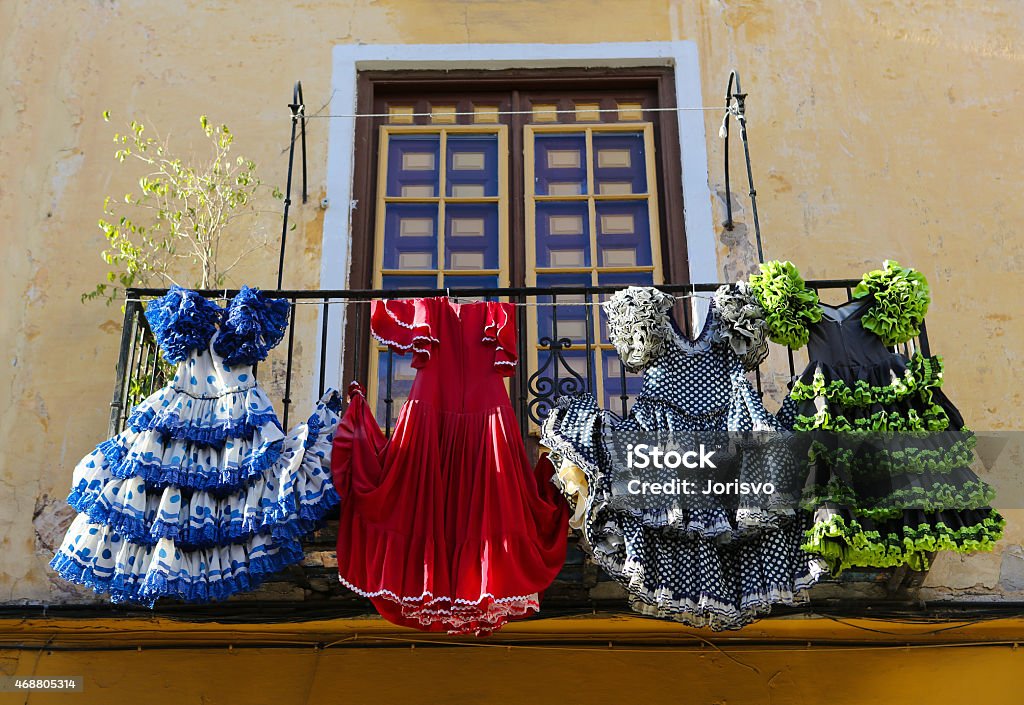 Traditional flamenco dresses at a house in Malaga, Andalusia, Sp Traditional flamenco dresses at a house in Malaga, Andalusia, Spain. Seville Stock Photo