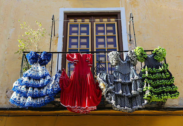 Traditional flamenco dresses at a house in Malaga, Andalusia, Sp Traditional flamenco dresses at a house in Malaga, Andalusia, Spain. costa del sol málaga province photos stock pictures, royalty-free photos & images