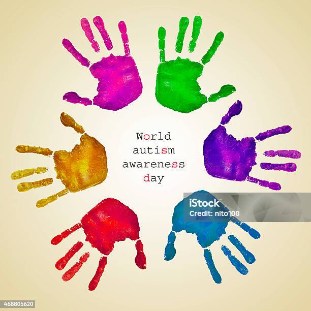 Handprints Of Different Colors And Text World Autism Awareness D Stock Photo - Download Image Now