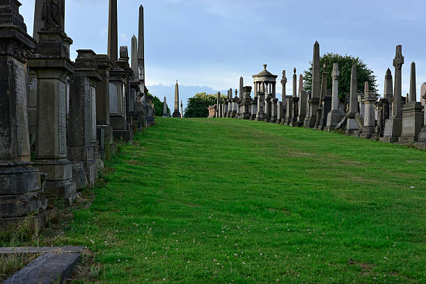 istock Glasgow Necropolis cemetery with tombs in a row 468811832