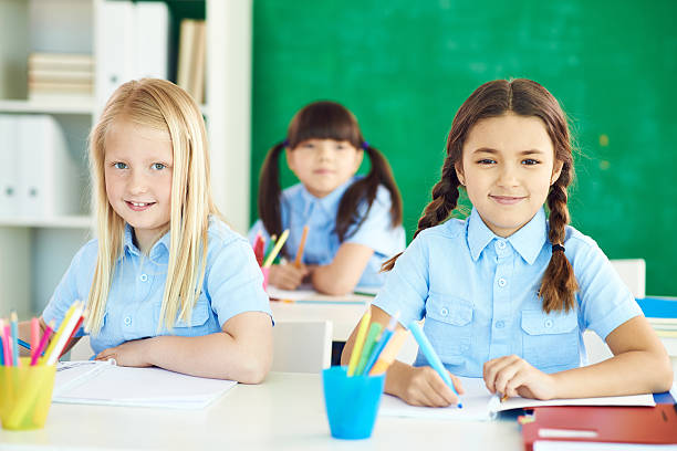istock Schoolgirls studying 468813460