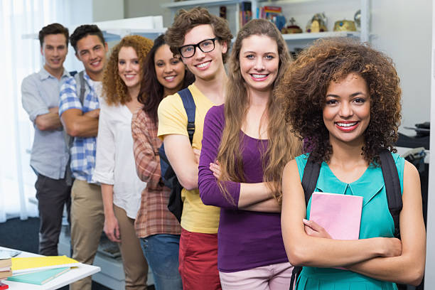 istock Group of young happy students smiling at camera 468813608