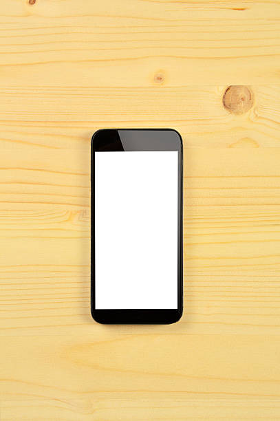 istock A blank screen smart phone on the wood table 468814212