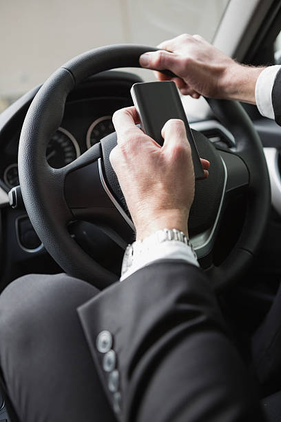 istock Close up of businessman sending a text message 468816560