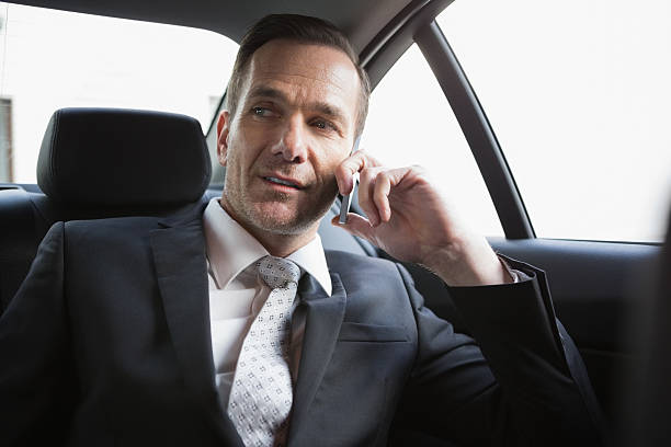 istock Handsome businessman making a phone call 468816568