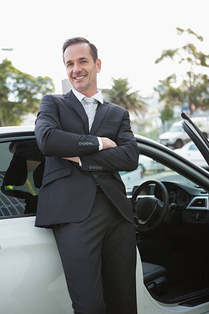 istock Handsome businessman smiling at camera 468816576
