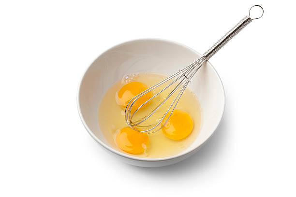 istock Egg yolks in a bowl with whisk 468817704
