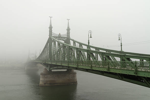 istock Bridge in the fog 468818627