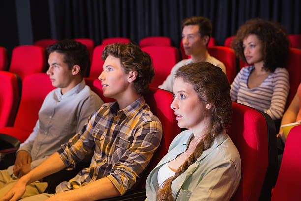 istock Young friends watching a film 468818710