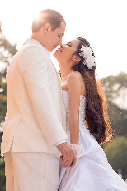 istock Kissing bridal couple 468818752