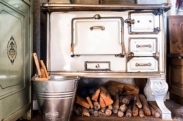 istock An old kitchen with a pile of firewood 468818768